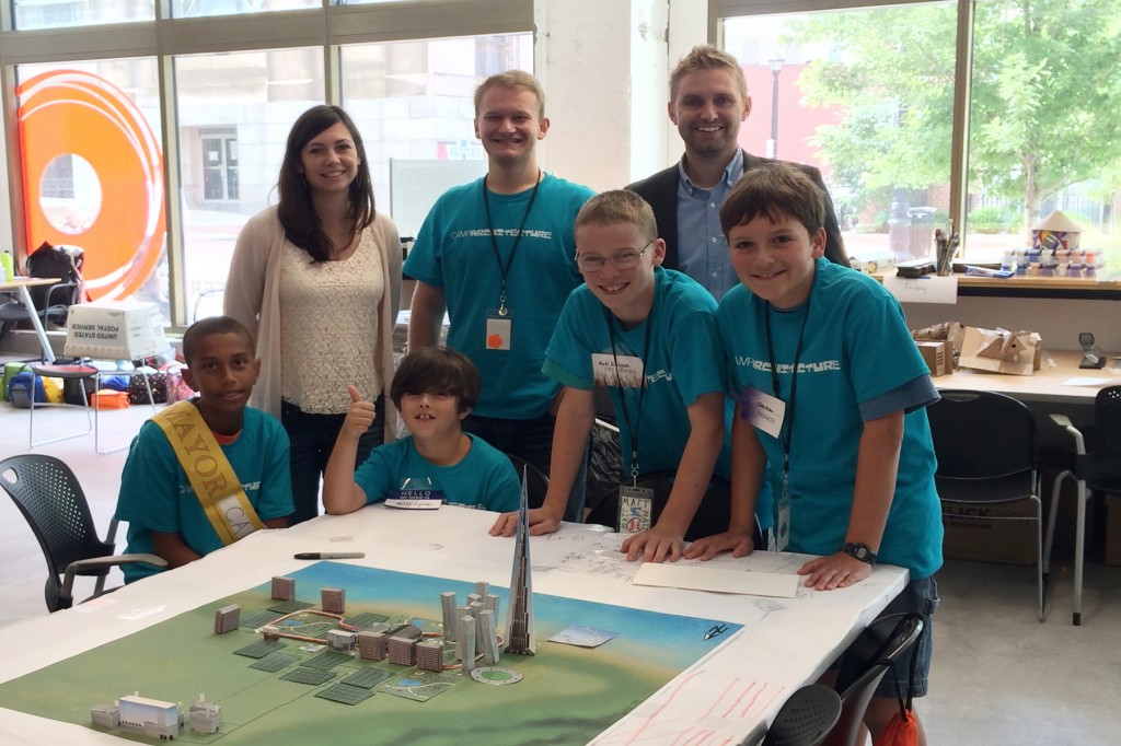 Sarah and Kyle with Camp Architecture children