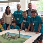 Sarah and Kyle with Camp Architecture children