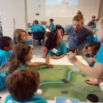 Campers work in teams to create the "best city" at Camp Architecture